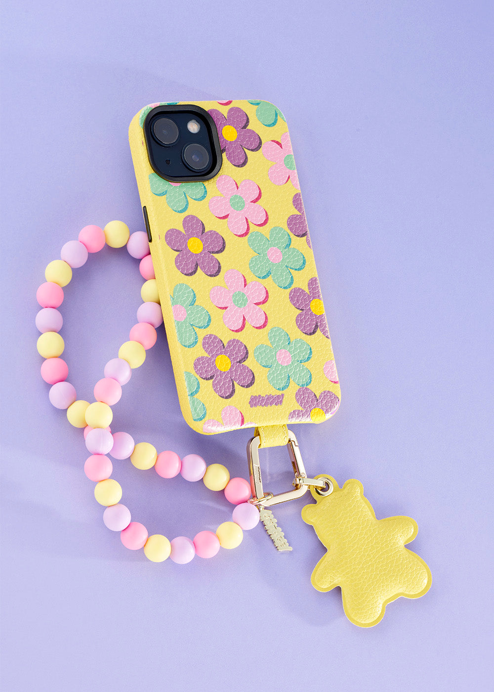 Cover Untags per iPhone 14 Pro gialla della collezione Bloom con charm e Phone Strap