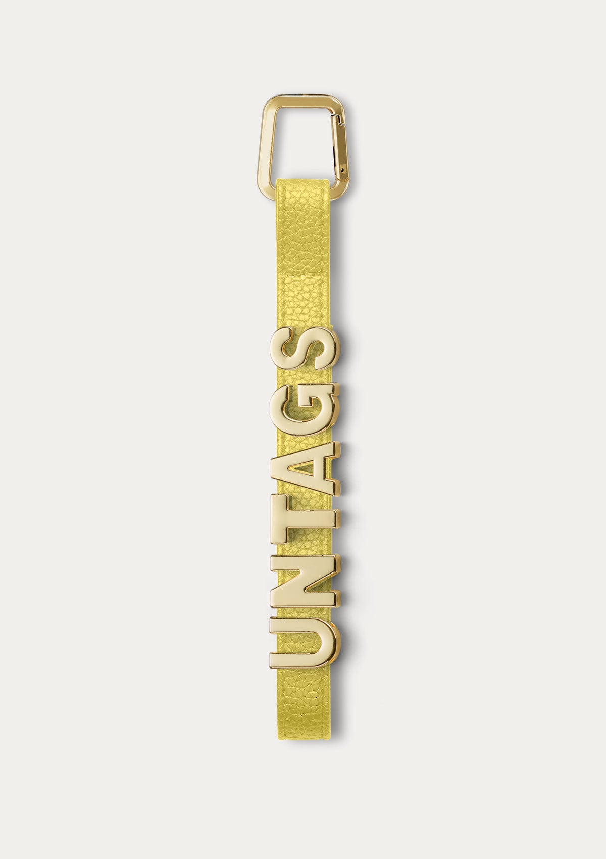 Phone Strap personalizzabile Untags di colore gialla per iPhone con lettere in metallo che compongono un testo personalizzato