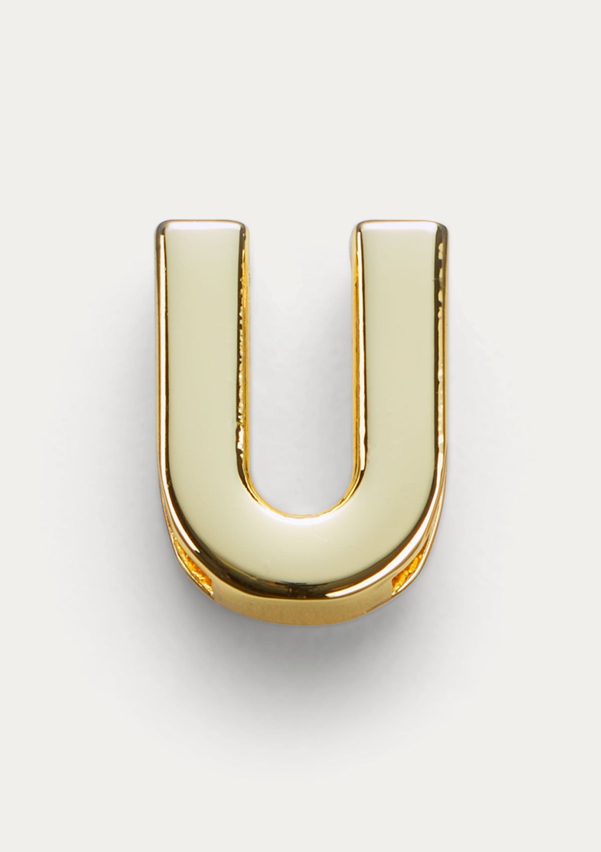 Vista frontale del Charm Untags Lettera U, in metallo dorato, per Phone Strap Personalizzabile