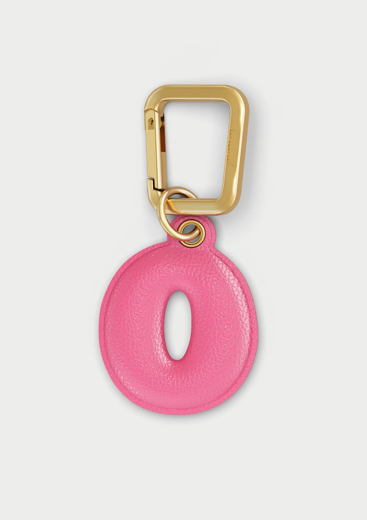 Charm Untags per iPhone a forma di lettera O, effetto pelle in colore rosa, con moschettone per attaccare l’accessorio alla cover