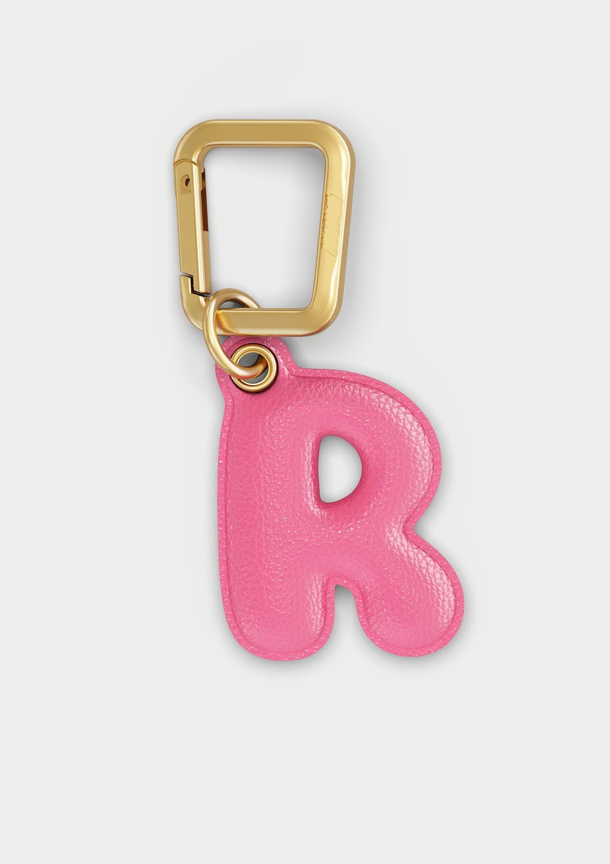 Charm Untags per iPhone a forma di lettera R, effetto pelle in colore rosa, con moschettone per attaccare l’accessorio alla cover