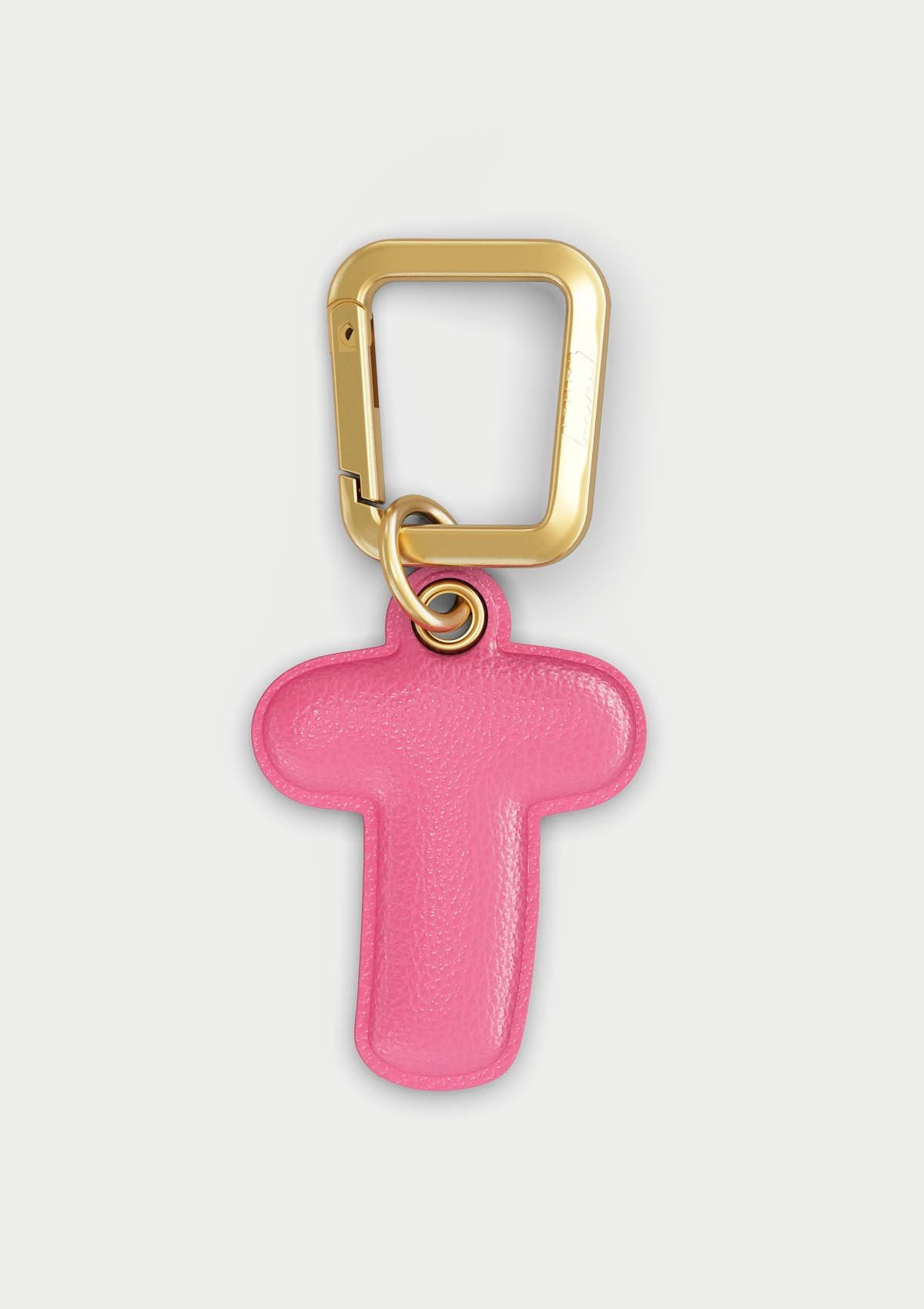 Charm Untags per iPhone a forma di lettera T, effetto pelle in colore rosa, con moschettone per attaccare l’accessorio alla cover